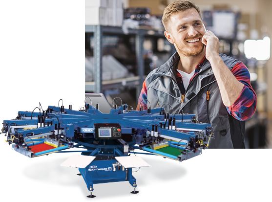 Man talking on phone, M&R screen printing machine