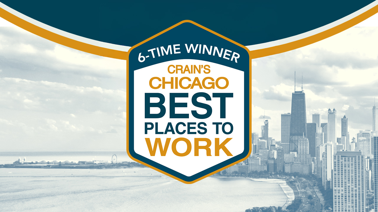 Crain's logo with years, Chicago skyline in background