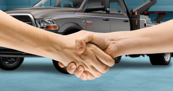 Two towers shake hands after meeting at a Tow Show. Two towers shake hands after meeting at a Tow Show.