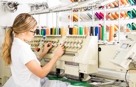 An employee calibrates a brand new machine that was financed with Beacon Funding. An employee calibrates a brand new machine that was financed with Beacon Funding.