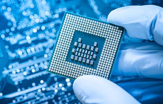 A closeup of a semiconductor computer chip. A closeup of a semiconductor computer chip.