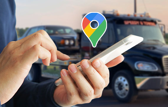 A customer finds a local towing company on Google Maps using their mobile phone. A customer finds a local towing company on Google Maps using their mobile phone.