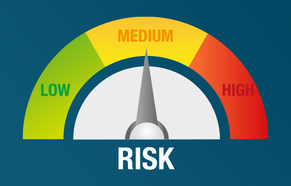 A guage showing the risk potential for an applicant is pointing in the middle towards "medium" risk. A guage showing the risk potential for an applicant is pointing in the middle towards "medium" risk.