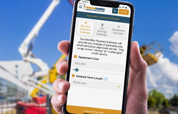 An entrepreneur uses their mobile device to calculate a low monthly payment for their next boom truck.