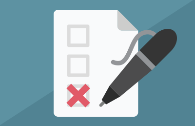 A black pen marks an "x" on a checklist.
