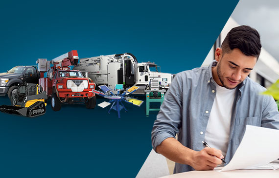 Young business owner checks his records to see if equipment financing makes sense for his growing business. Young business owner checks his records to see if equipment financing makes sense for his growing business.
