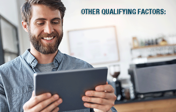 A start-up business owner reviews Beacon Funding's qualifying criteria to get approved for equipment financing on his tablet. A start-up business owner reviews Beacon Funding's qualifying criteria to get approved for equipment financing on his tablet.
