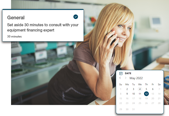 Woman looking at cpmputer, schedule a meeting booking