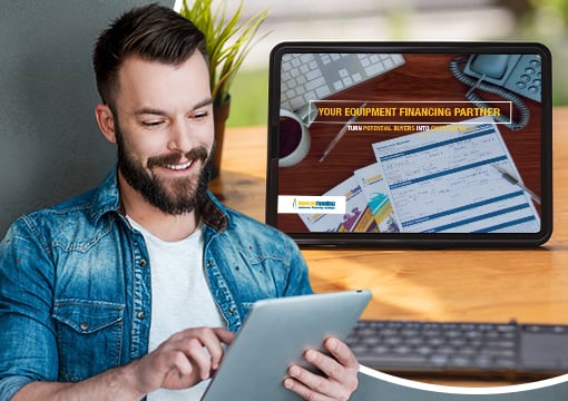 man looking at tablet smiling.image of eBook on tablet in background
